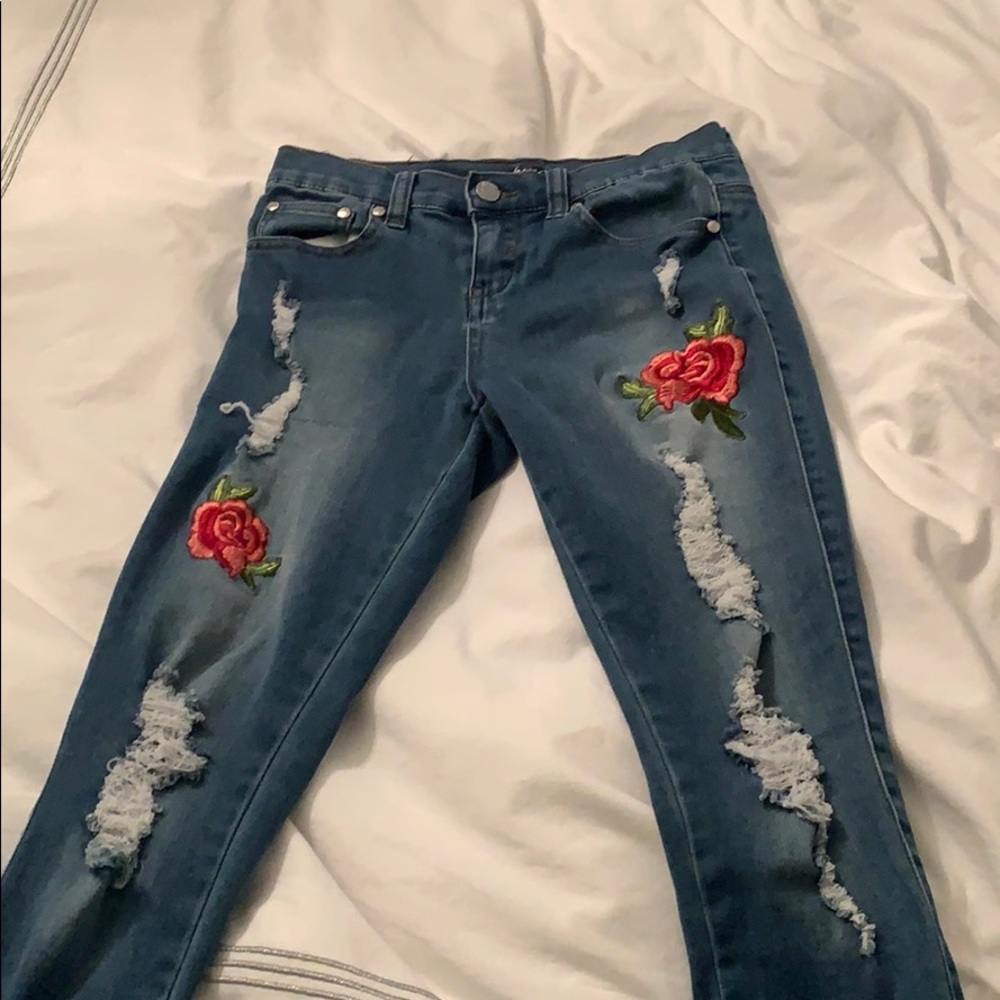 Rose embroidered ripped jeans